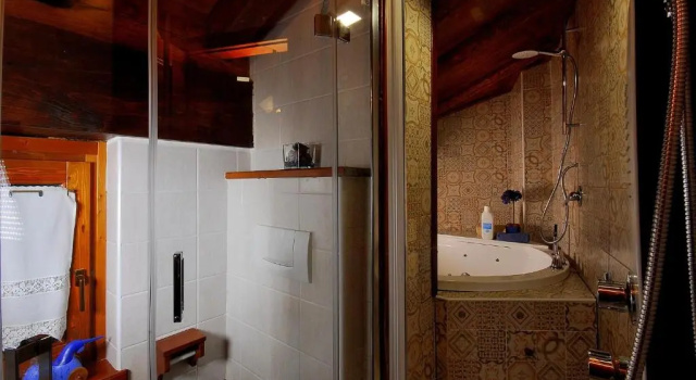 Люкс Deluxe Aparthotel Foyer dantan SUITE con caminetto hammam o vasca idromassaggio