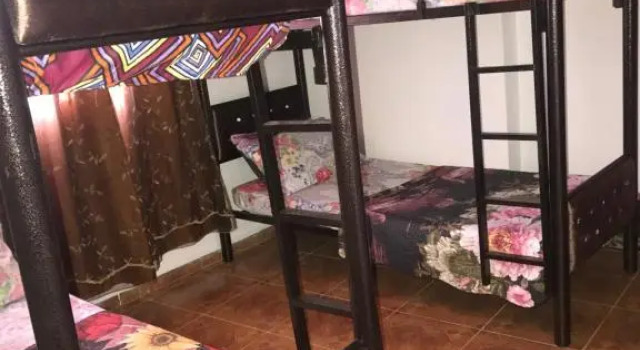 Cama em dormitório Sami Hostel
