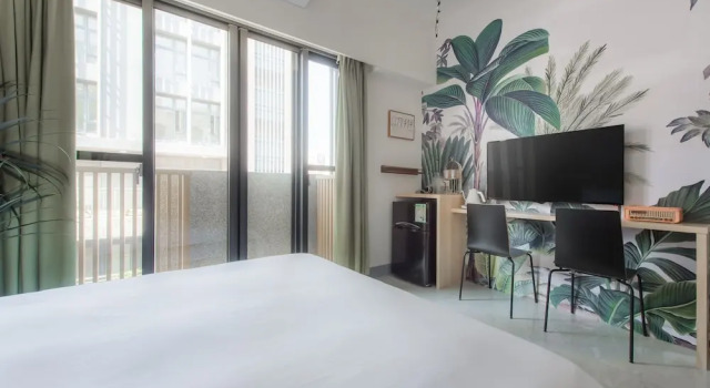 Люкс с 2 комнатами с балконом Bing Nong Homestay