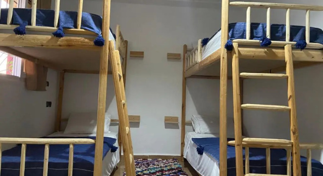 Кровать в общем номере Caban Surf