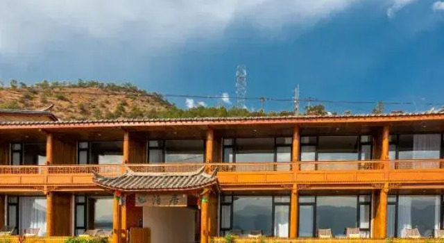 Luguhu Poju Inn, Buchen Sie Hotel Luguhu China