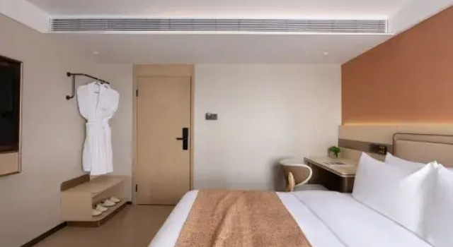 Кровать в общем номере Immersing Hotel Guihu Branch