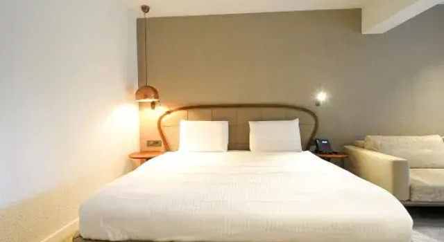 Номер Deluxe Garrya Romo Hotel