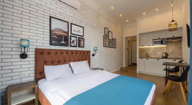 Апартаменты Deluxe с балконом и с видом на город Central Dayflat Apartments
