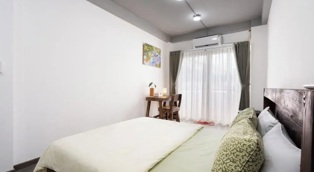 Четырёхместные апартаменты Deluxe с балконом и с видом на город Maple Homestay