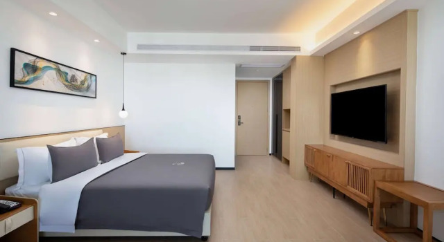 Номер Standard Ramada Encore by Wyndham Jiusuo Downtown