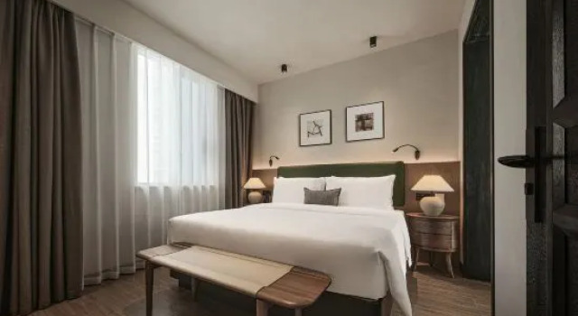 Люкс с 4 комнатами Rainbird Hotel