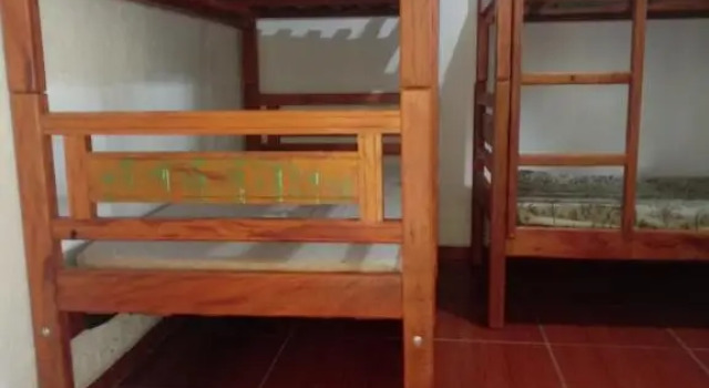 Casa 2 minutos a pé da Praia de INDAIÁ, Забронировать Отель Отели Бертиога с парковкой, рядом с Пляж Виста Линда, Парковка