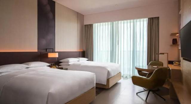 Четырёхместный клубный номер Standard Renaissance Haikou Hotel
