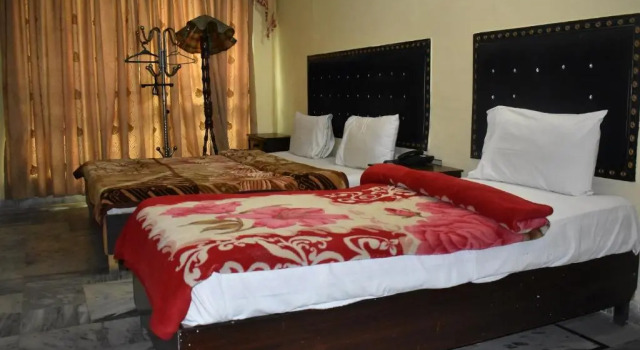 New Choice Inn House, Boek Hotel Hotels en accommodaties in G-9 Sector, Hotel