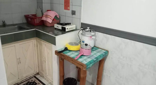 Кровать в общем номере Istroberi Inn Palawan near Airport