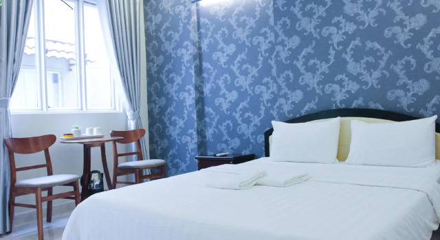 Кровать в общем номере Violet Star Hotel and Spa