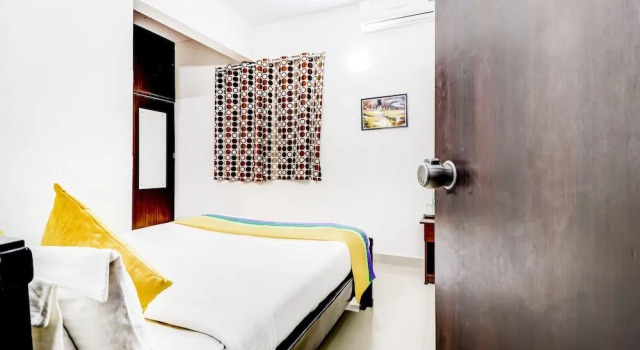 Treebo Trip Roxel Inn, Забронировать Отель Индиранагар Бангалор, рядом с Больница Манипал