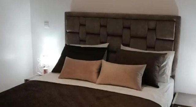 Кровать в общем номере Appart Hotels Wouroud
