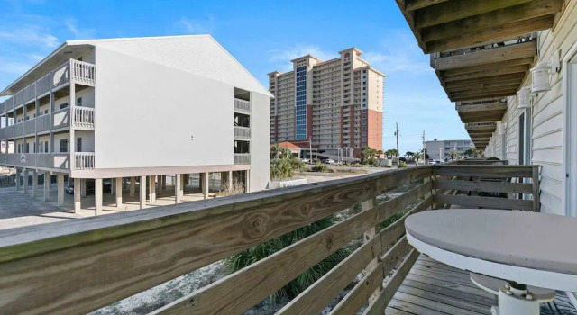 Spacious 2BR Condo With Pool Steps From the Beach