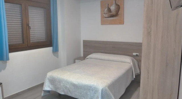 Трёхместный семейный номер Standard Hostal y apartamentos Casa Fermina