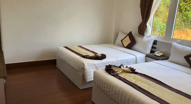 Четырёхместный номер Deluxe Tommy hotel khe sanh dalat