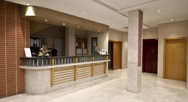 Кровать в общем номере Hotel NS Albolut