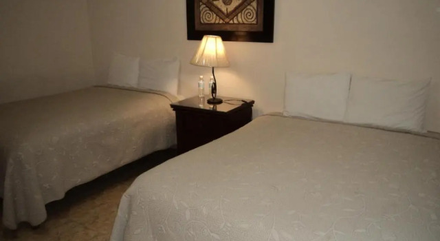 Четырёхместный номер Standard Mansion Serrano Hotel
