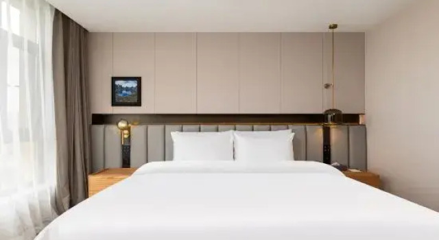 Люкс Deluxe Meilun Hotel (Second Avenue Baihe Store, North Slope Distribution Center, Changbai Mountain)