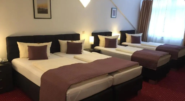 Четырёхместный номер Standard Wincent Hotel GmbH