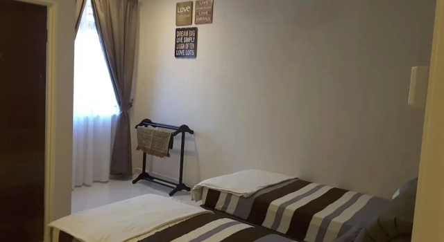 Коттедж Laman Kurnia Holiday House