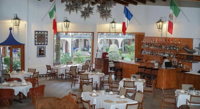Кровать в общем номере Hotel El Rebozo