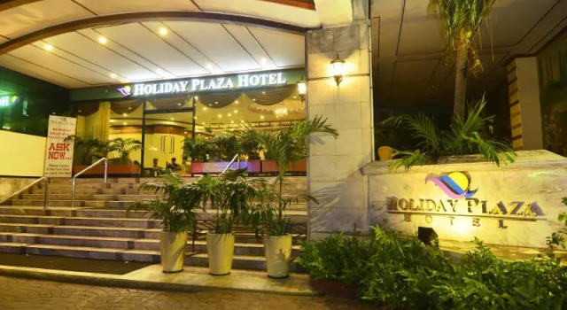 Кровать в общем номере Holiday Plaza Hotel - Cebu