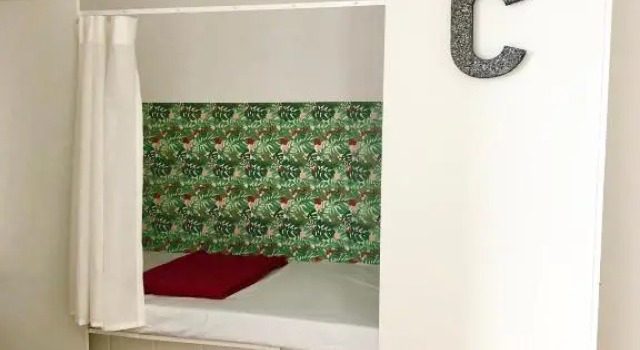 Кровать в общем номере Backpackers Las Eras