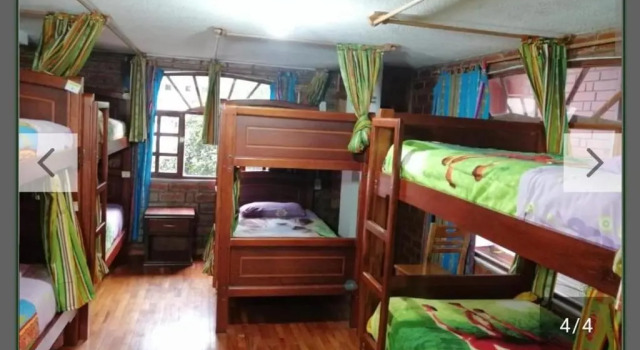 Кровать в общем номере Hostal D´Mathias