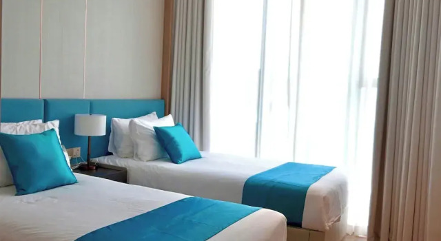 Четырёхместный номер Deluxe с балконом и с видом на море Alacarte Ha Long Bay By Azure - Can Ho Huong Bien