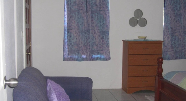 Коттедж с 2 комнатами с балконом Caye Caulker Vacation Homes