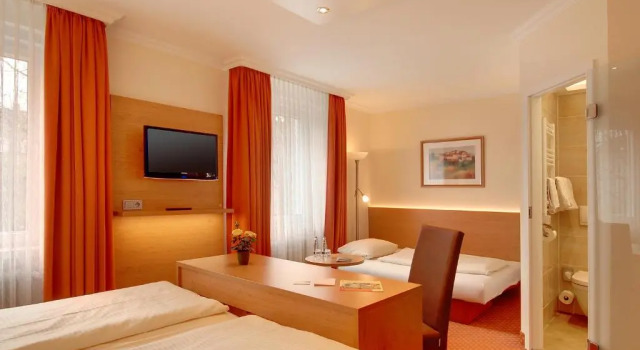 Четырёхместный номер Comfort Hotel Kriemhild am Hirschgarten
