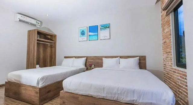 Кровать в общем номере Tran Long Cu Hin Hotel