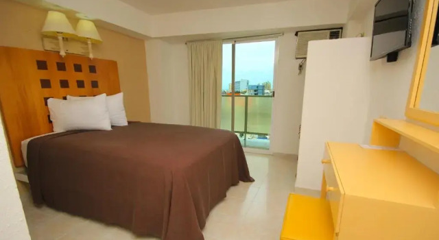 Четырёхместный номер Standard с красивым видом из окна Hotel Posada del Carmen