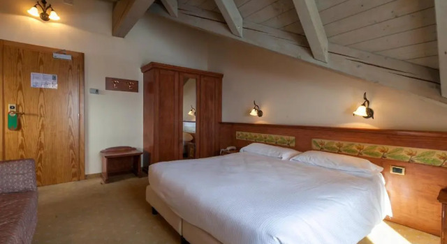 Четырёхместный номер Deluxe Hotel Delle Alpi