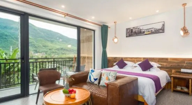 Кровать в общем номере с 6 комнатами Moganshan Shisu Parent-child Holiday Homestay