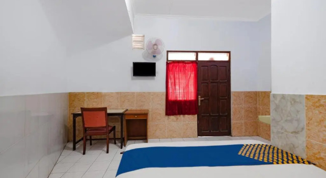 Standard Casal quarto Hotel O Sartika Inn Pati