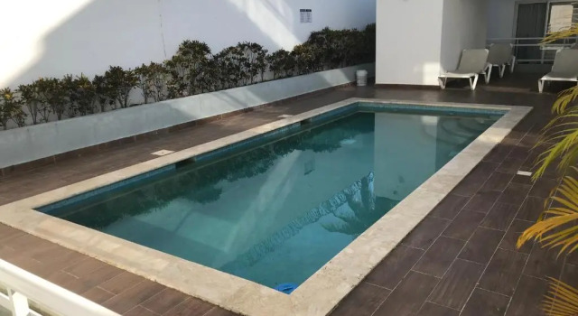 Коттедж Beach Town Condo 2 Rooms
