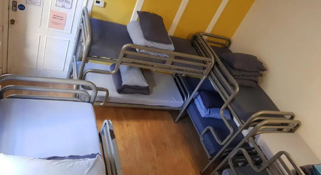 Кровать в общем номере Bath Backpackers