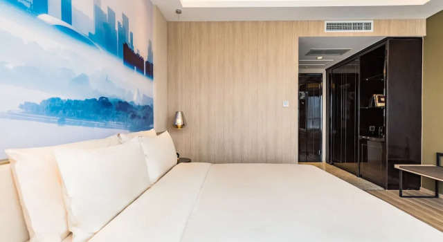 Номер Deluxe Green Oriental Hotel (Shenzhen Pinghu South China City Hehua subway station)