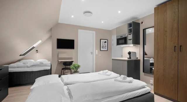 Четырёхместный люкс Stay Byparken - Self-Service Hotel