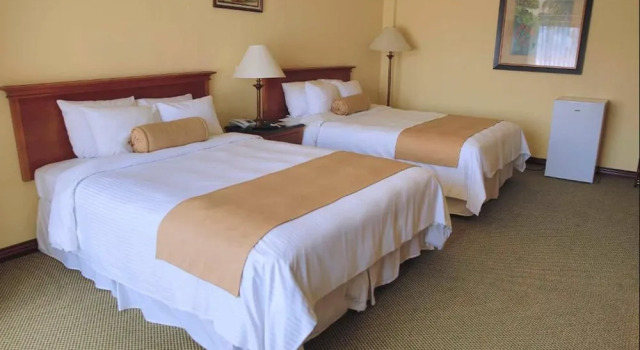 Четырёхместный номер Standard с красивым видом из окна Wyndham San Jose Herradura