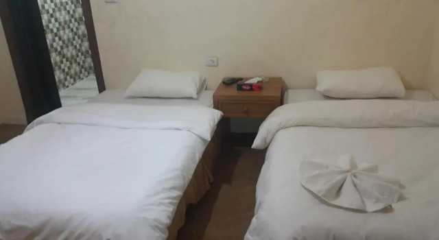 Трёхместный номер Al-Houriat Hotel