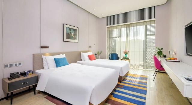 Standardowy dwuosobowy pokój Lujiang Mega Hotel
