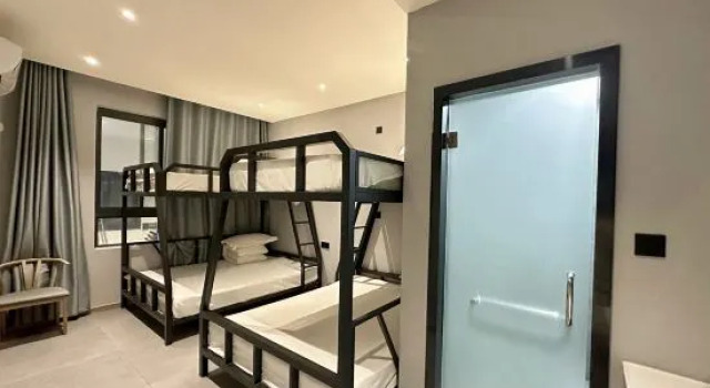 Кровать в общем номере W E-sports Hotel