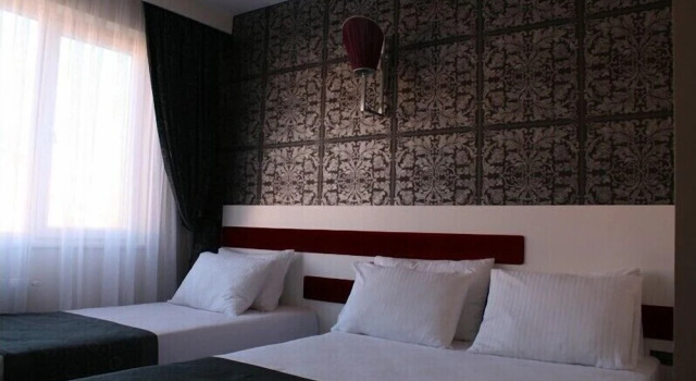 Трёхместный номер Standard Kadhirga Hotel