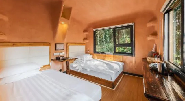 Кровать в общем номере Jiuzhou Yizhan Resort (Yingde Tianmengou)