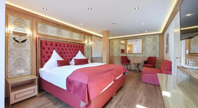 Четырёхместный номер Deluxe Hotel Ludwigs