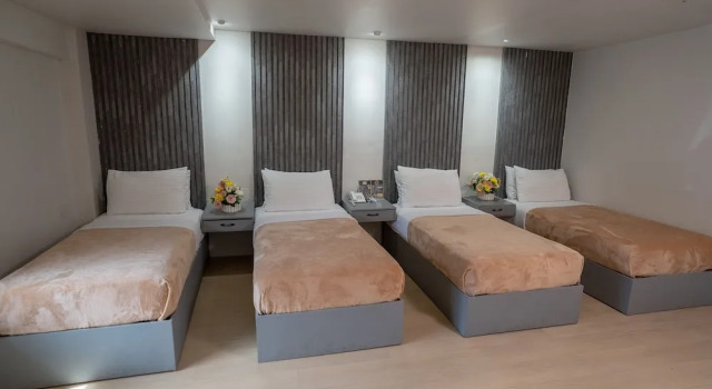 Четырёхместный номер Deluxe Hotel Carmelita